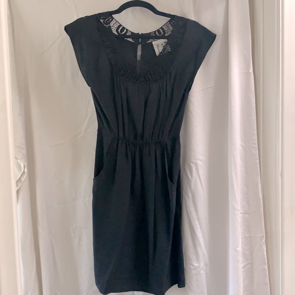 Black pocketed silk cocktail dress